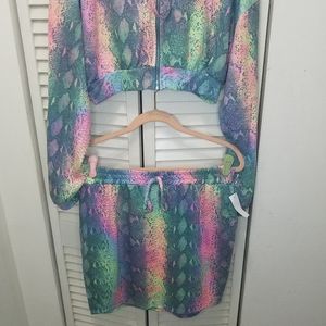 2 peice  set mini skirt  and crop hoodie top . 20 inc across the chest.